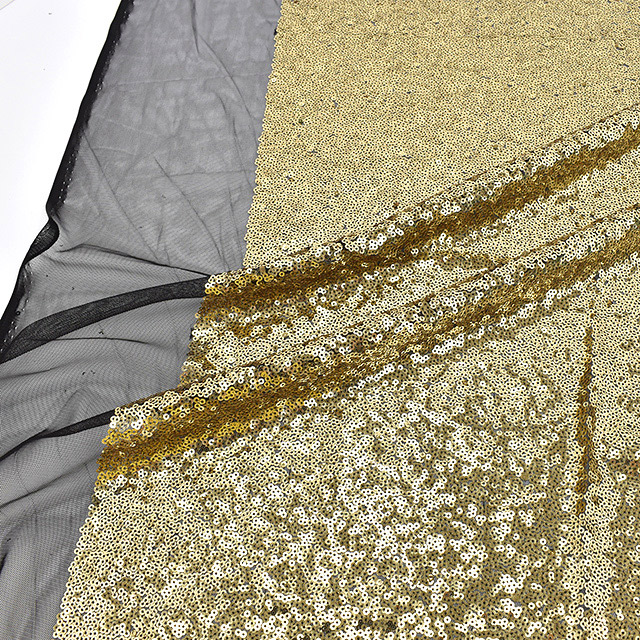 スパンコール生地 アリアナスパン(160412) 11.ゴールド×ブラック 10Ad06_