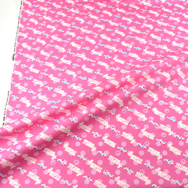 カットクロス お菓子コラボプリント生地 ミルキー ロゴ/オックス(okashi1M) ピンク 99Zz99_